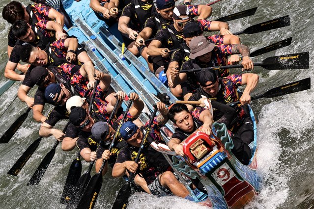 Revelers paddle as they participate in a dragon boat race to celebrate the Dragon Boat Festival in Taipei, Taiwan, 08 June 2024. The Dragon Boat Festival, also known as the Duanwu Festival, falls on the fifth day of the fifth month in the Chinese lunar calendar in honor of Qu Yuan, an ancient Chinese poet and statesman. (Photo by Ritchie B. Tongo/EPA)