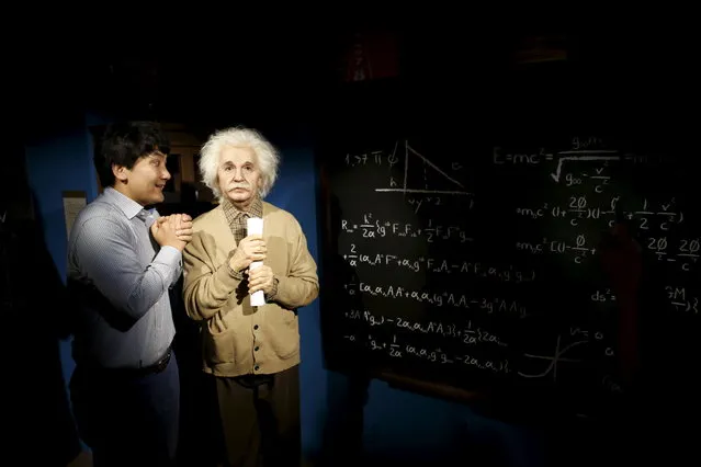 A man jokes next to the wax figure of Albert Einstein at Grevin Wax Museum in central Seoul, South Korea, July 30, 2015. (Photo by Kim Hong-Ji/Reuters)