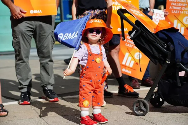 Edith (surname not given), age one, joins medical consultant members of the British Medical Association (BMA) on the picket line outside Bristol Royal Infirmary amid their dispute with the Government over pay on Thursday, August 24, 2023. (Photo by Ben Birchall/PA Images via Getty Images)