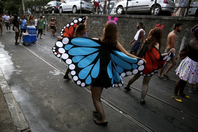 A reveller takes part in an annual block party known as “Ceu na Terra” (Heaven on Earth), one of the many carnival parties to take place in the neighbourhoods of Rio de Janeiro February 6, 2016. (Photo by Pilar Olivares/Reuters)