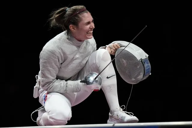Sofia Pozdniakova celebrates after the gold at the women's individual Sabre final competition at the 2020 Summer Olympics, Monday, July 26, 2021, in Chiba, Japan. (Photo by Andrew Medichini/AP Photo)