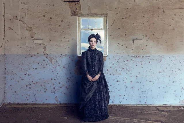 The School, by Brett Ferguson. Winner in the people and portrait category. Shot in an abandoned and derelict school, Ferguson collaborated with dressmaker and model Meagan O’Keeffe who, inspired by Ferguson’s grandmother, handmade her period costume from scratch for a series of bold portraits that show the photographer’s love of mood and depth. (Photo by Brett Ferguson/Australia's 2018 Photographer of the Year by Panasonic)