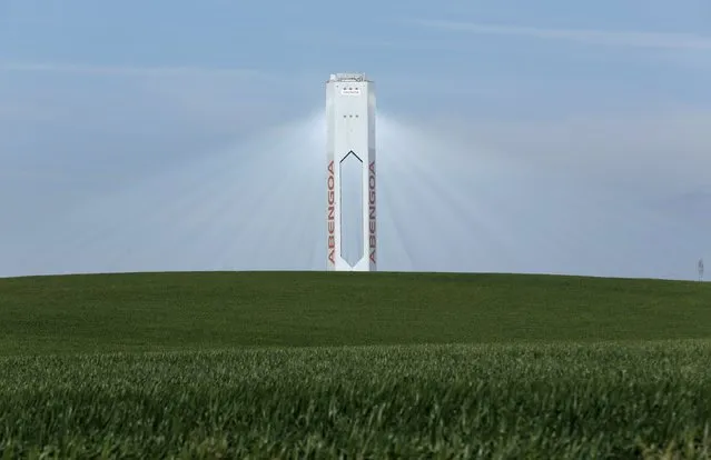 A tower belonging to the Abengoa solar plant is seen at the “Solucar” solar park in Sanlucar la Mayor, near the Andalusian capital of Seville, southern Spain March 4, 2016. (Photo by Marcelo del Pozo/Reuters)