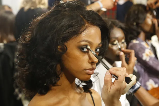 A model is made up backstage prior to the Tommy Now ready to wear Fall-Winter 2019-2020 collection, that was presented in Paris, Saturday, March 2, 2019. (Photo by Michel Euler/AP Photo)