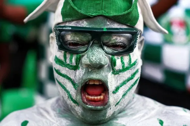 A Nigeria's supporter reacts ahead of the Africa Cup of Nations (CAN) 2024 group A football match between Guinea-Bissau and Nigeria at the Felix Houphouet-Boigny Stadium in Abidjan on January 22, 2024. (Photo by Franck Fife/AFP Photo)