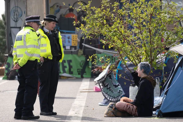 Protesters from Extinction Rebellion continue to occupy Waterloo Bridge for a fourth day of an ongoing protest in London, England on April 18, 2019. (Photo by Ray Tang/Shutterstock)