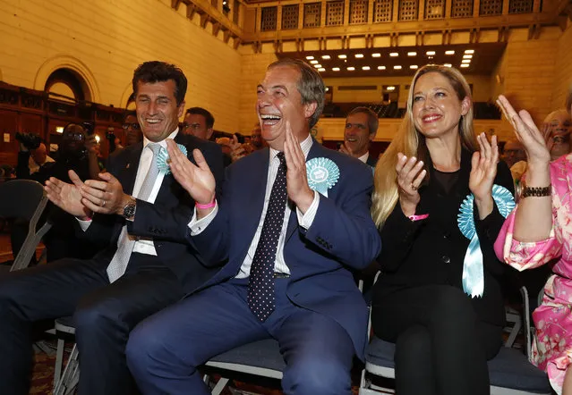 Brexit Party leader Nigel Farage reacts as results from other parts of the country are announced at the counting center for the European Elections for the South East England region, in Southampton, England, Sunday, May 26, 2019. (Photo by Alastair Grant/AP Photo)