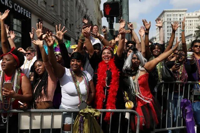 People cheer at floats passing by during the Krewe of Zulu parade during Mardi Gras in New Orleans, Louisiana U.S., February 28, 2017. (Photo by Shannon Stapleton/Reuters)