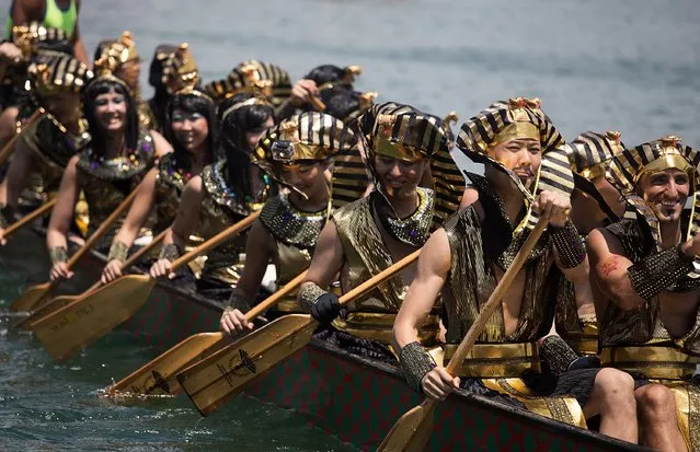 Dragon boat racers prepare for the fancy dress race on July 5, 2015 in Hong Kong, Hong Kong. (Photo by Taylor Weidman/Getty Images for Hong Kong Images)
