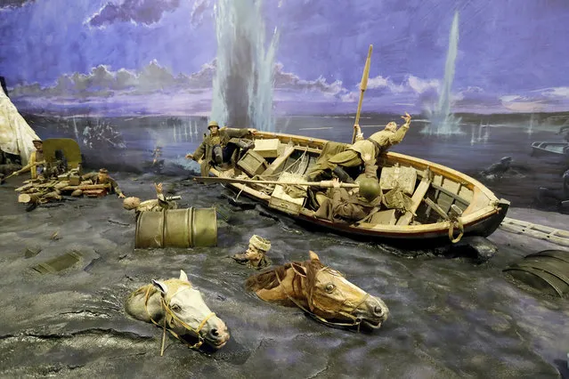 A scene showing Soviet soldiers “Crossing the Dnieper River” during World War II is prepared for the opening of the 3D Panorama exhibition “Memory talks. The road through war” in the former Sevcabel port in St. Petersburg, Russia, 16 September 2019. (Photo by Anatoly Maltsev/EPA/EFE)
