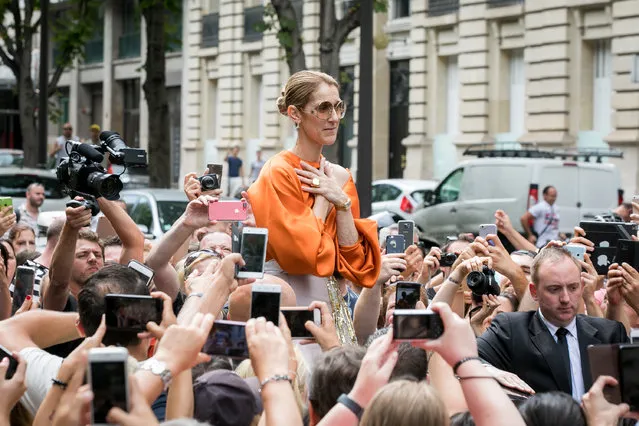Singer Celine Dion is surrounded by french fans as she leaves the “Royal Monceau” hotel on Avenue Hoche on July 9, 2017 in Paris, France. (Photo by Marc Piasecki/GC Images)