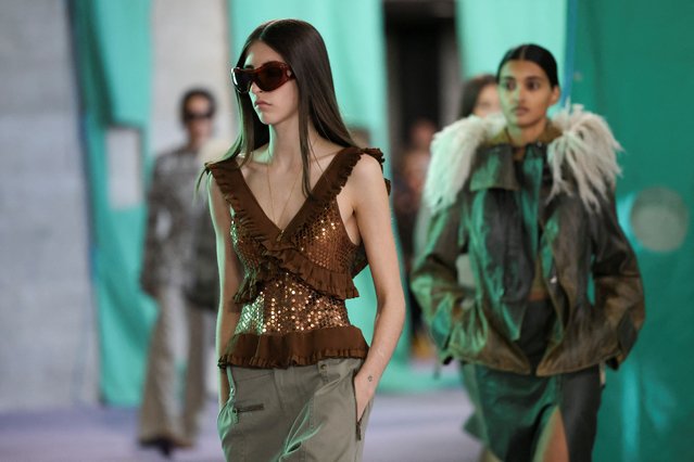 Models present creations at the Burberry catwalk show during London Fashion Week in London, Britain, on September 16, 2024. (Photo by Hollie Adams/Reuters)