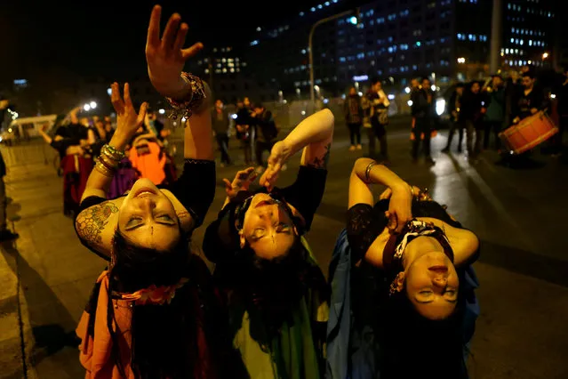 Pro-abortion activists perform a dance during a rally held to support women's rights to an abortion in Santiago, Chile July 25, 2017. (Photo by Ivan Alvarado/Reuters)