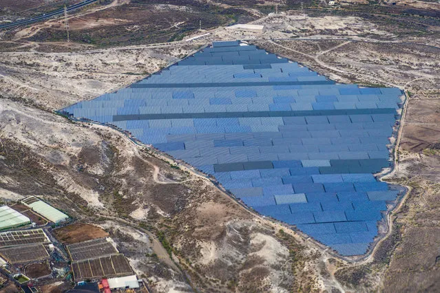 Shortlisted: Stuart Gleave. A large array of solar panels located on Tenerife’s southern coast. (Photo by Stuart Gleave/2016 EPOTY)