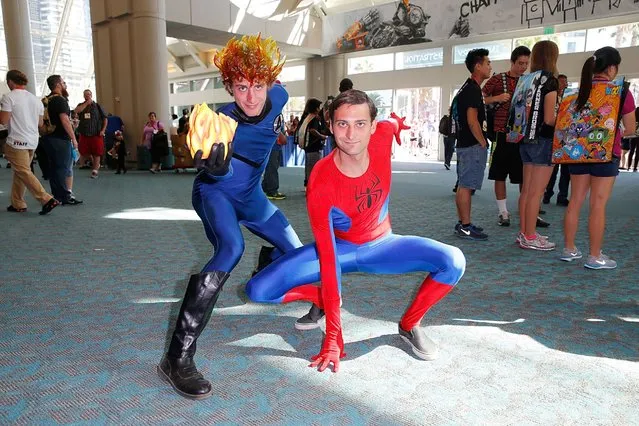 Fans in costume attend Comic-Con International 2014 - Day 1 on July 24, 2014 in San Diego, Calif. (Photo by Joe Scarnici/FilmMagic/Getty Images)