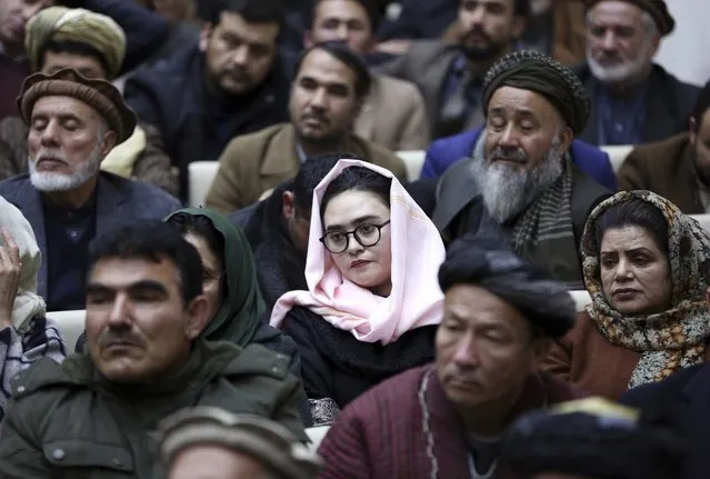 Party members listen to a speech by Afghan presidential candidate Abdullah Abdullah during a conference in Kabul, Afghanistan, Sunday, January 26, 2020. (Photo by Rahmat Gul/AP Photo)