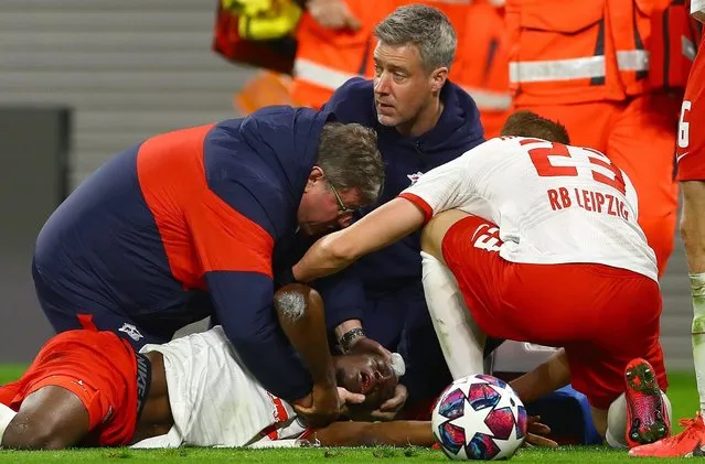 Nordi Mukiele of RB Leipzig is stretchered off the pitch after he receives medical treatment during the UEFA Champions League round of 16 second leg match between RB Leipzig and Tottenham Hotspur at Red Bull Arena on March 10, 2020 in Leipzig, Germany. (Photo by Kieran McManus/BPI/Rex Features/Shutterstock)