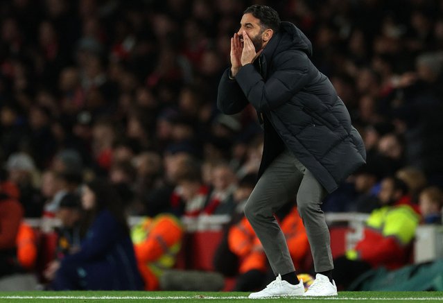 Manchester United's Portuguese head coach Ruben Amorim shouts instructions to the players from the touchline the English Premier League football match between Arsenal and Manchester United at the Emirates Stadium in London on December 4, 2024. (Photo by Adrian Dennis/AFP Photo)