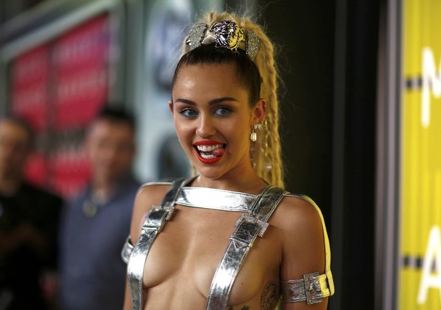 Show host Miley Cyrus arrives at the 2015 MTV Video Music Awards in Los Angeles, California August 30, 2015. (Photo by Mario Anzuoni/Reuters)