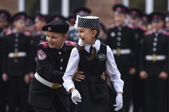 Cadets of the Siberian military school attend a ceremony marking Knowledge Day in Novosibirsk, Russia on September 1, 2017. The holiday marks the beginning of a new school year in Russia and is celebrated on September 1. (Photo by Kirill Kukhmar/TASS)