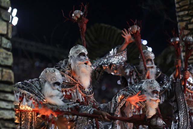 Revelers from Porto da Pedra samba school perform during the night of the Carnival parade at the Sambadrome, in Rio de Janeiro, Brazil, on February 11, 2024. (Photo by Ricardo Moraes/Reuters)