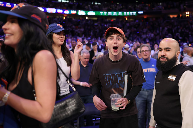Kendall Jenner (C), Kylie Jenner (R) and Timothee Chalamet (2R) celebrate during the fourth quarter in Game Four of the Eastern Conference Second Round NBA Playoffs at Madison Square Garden on May 12, 2025 in New York City. (Photo by Elsa/Getty Images)