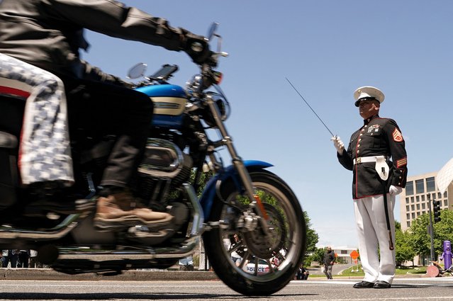 Motorcyclists participate in the 'Rolling to Remember' motorcycle rally, riding through the nation's capital to raise awareness about issues faced by veterans, in Washington, D.C., on May 25, 2025. (Photo by Ken Cedeno/Reuters)