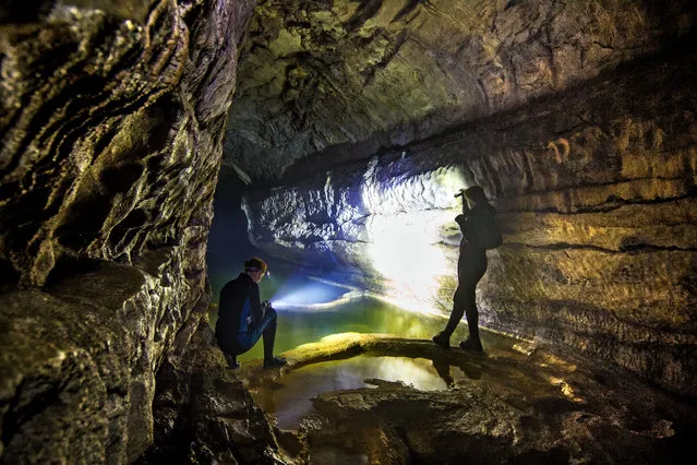 A caver known only as Flick (L) and an unknown caver. (Photo by Vladimir Mulde/Caters News)
