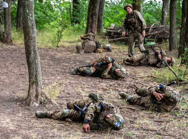 Foreign volunteers of the 13th Operative Purpose Brigade “Khartiia” of the National Guard of Ukraine attend military exercises at a training ground near a front line, amid Russia's attack on Ukraine, in Kharkiv region, Ukraine on June 25, 2025. (Photo by Viacheslav Ratynskyi/Reuters)