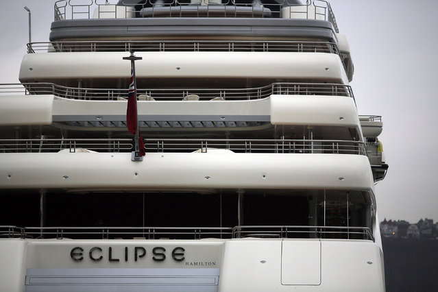 The Eclipse, reported to be the largest private yacht in the world, is viewed docked at a pier in New York on February 19, 2013 in New York City. The boat, which measures 557ft in length and is estimated to cost 1.5 billion US dollars, is owned by Russian billionaire Roman Abramovich and arrived into New York on Wednesday.  (Photo by Spencer Platt)