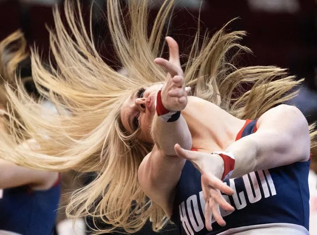 One of the Houston Rockets NBA basketball team’s cheerleaders — known as the Power Dancers – in action during a game against the New Orleans Pelicans at Toyota Center on March 19, 2023 in Houston, Texas. The Rockets won 114-112. (Photo by Thomas Shea/Reuters)