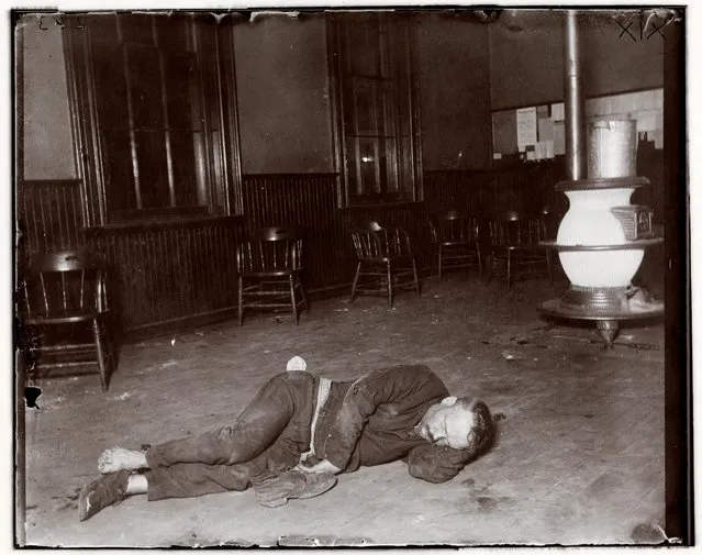 Police Station Lodgers 19. The typhus lodger in Eldridge Street, he lay by the stove in the policemen’s room no one dreaming what ailed him. (Photo by Jacob A. Riis/Museum of the City of New York, Gift of Roger William Riis)