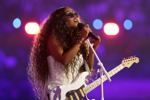 US singer H.E.R. takes to the stage during the closing ceremony of the Paris 2024 Olympic Games at the Stade de France, in Saint-Denis, in the outskirts of Paris, on August 11, 2024. (Photo by Franck Fife/AFP Photo)
