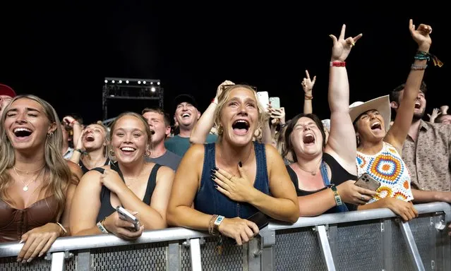 People watch a performer at Railbird Music Festival on Saturday, June 3, 2023, at The Infield at Red Mile in Lexington, Ky. (Photo by Amy Harris/Invision/AP Photo)