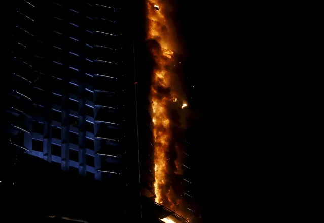 A fire engulfs The Address Hotel in downtown Dubai in the United Arab Emirates December 31, 2015. (Photo by Ahmed Jadallah/Reuters)