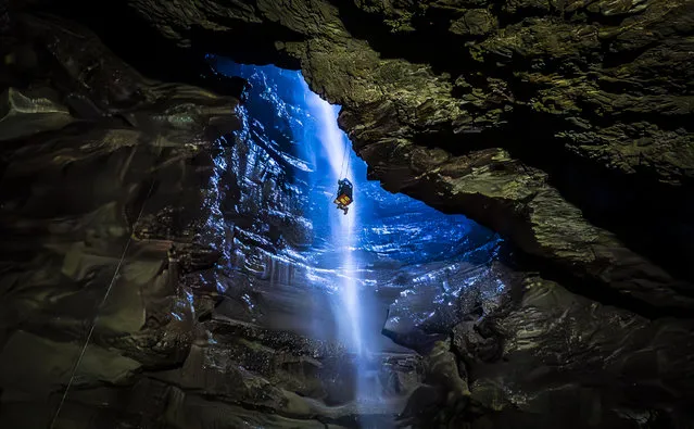 A potholer is winched into Gaping Gill, the largest cavern in Britain, situated in Yorkshire Dales National Park as it opens to the public this weekend. Picture date: Sunday May 28, 2023. (Photo by Danny Lawson/PA Images via Getty Images)