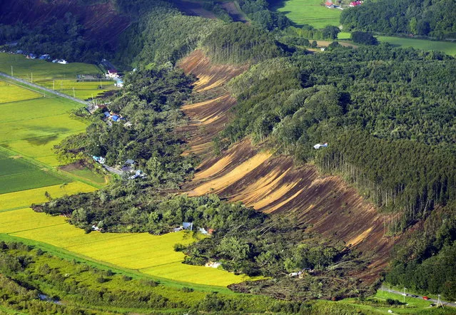 An aerial photo shows the aftermath of a large landslide that occurred after an earthquake hit Hokkaido, in Atsuma, northern Japan, 06 September 2018. According to the Japan Meteorological Agency, a strong earthquake of 6.7 magnitude jolted Japan's northern island of Hokkaido in the early hours of 06 September causing large landslides and blackouts. A blackout over Hokkaido is affecting almost 3 million households. (Photo by EPA/EFE/JIJI Press)