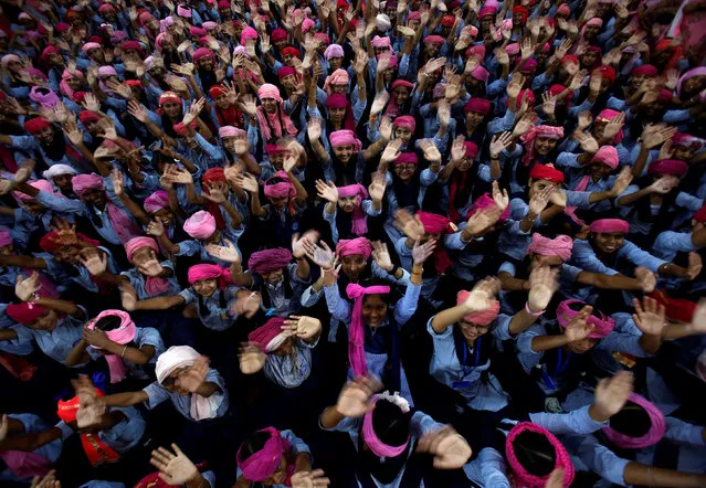 School girls wearing pink turban wave during celebrations to mark International Day of the Girl Child 2018, at a school in Chandigarh, India October 11, 2018. (Photo by Ajay Verma/Reuters)