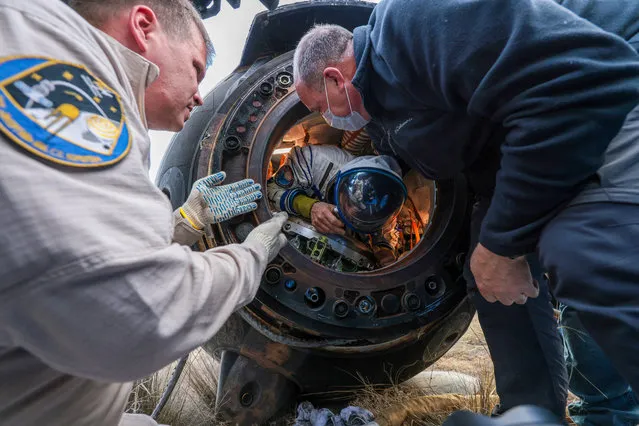 In this photo released by Roscosmos space corporation, rescue team members help NASA astronaut Frank Rubio to get out the capsule shortly after the landing of the Russian Soyuz MS-23 space capsule about 150 km (90 miles) south-east of the Kazakh town of Zhezkazgan, Kazakhstan, Wednesday, September 27, 2023. The Soyuz capsule carrying NASA astronaut Frank Rubio, Roscosmos cosmonauts Sergey Prokopyev, and Dmitri Petelin, touched down on Wednesday on the steppes of Kazakhstan. (Photo by Ivan Timoshenko, Roscosmos space corporation via AP Photo)