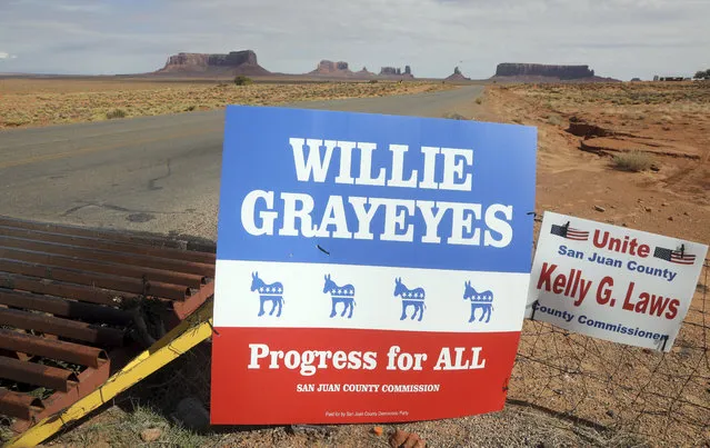 In this Thursday, October 25, 2018, photo, a campaign sign for Democratic county commission candidate Willie Grayeyes, is shown in Monument Valley, Utah. Grayeyes is running in a new, 65-percent Navajo district on local issues like new school buses and better road maintenance. If Grayeyes wins, the three-person commission could be majority Navajo for the first time. (Photo by Rick Bowmer/AP Photo)