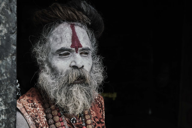 A holy man with a painted face, taken in Kathmandu, Nepal. (Photo by Jan Moeller Hansen/Barcroft Images)