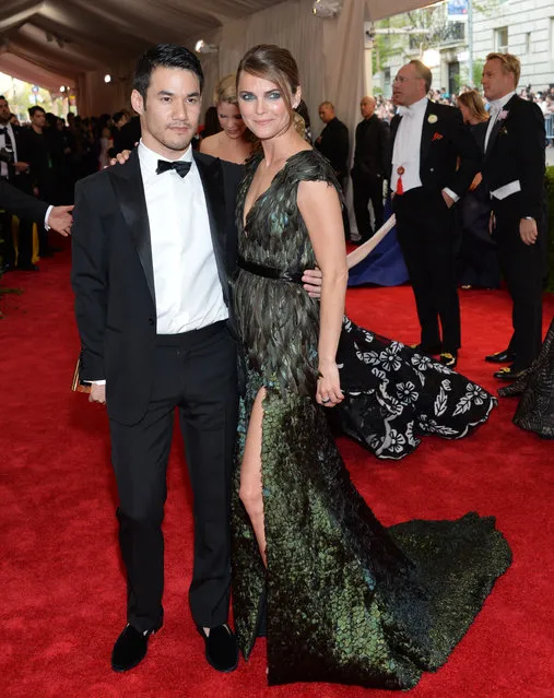 Designer Joseph Altuzarra and Keri Russell arrive at The Metropolitan Museum of Art's Costume Institute benefit gala celebrating “China: Through the Looking Glass” on Monday, May 4, 2015, in New York. (Photo by Evan Agostini/Invision/AP Photo)