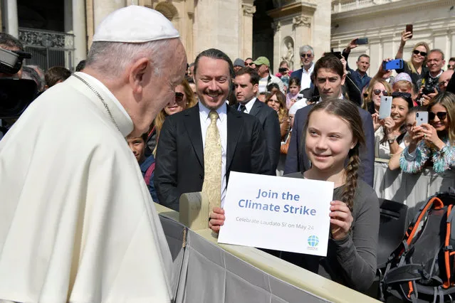 Climate activist Swedish teenager Greta Thunberg meets Pope Francis during the weekly audience at Saint Peter's Square at the Vatican, April 17, 2019. (Photo by Vatican Media/Handout via Reuters)