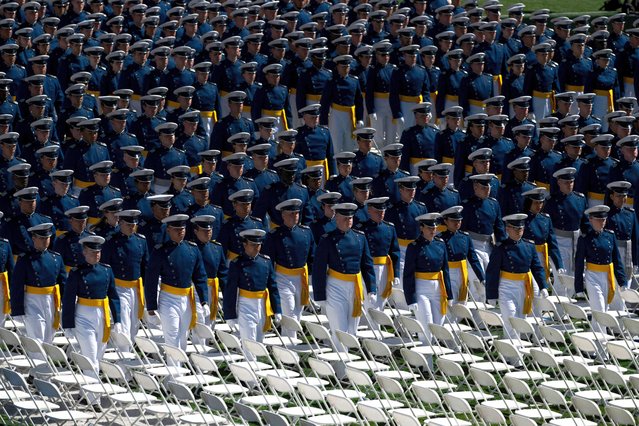 The United States Air Force Academy Class of 2024 march to their seats at the start of the commencement ceremony at Falcon Stadium on Thursday, May 30, 2024, in Colorado Springs, Colo. (Photo by Parker Seibold/AP Photo)