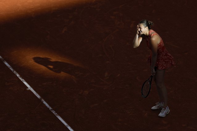 Aryna Sabalenka of Belarus reacts after missing a shot against Russia's Mirra Andreeva during their quarterfinal match of the French Open tennis tournament at the Roland Garros stadium in Paris, Wednesday, June 5, 2024. (Photo by Aurelien Morissard/AP Photo)