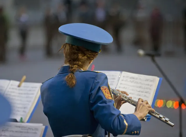 A military band performs during Victory Day celebrations in Odessa, Ukraine, Friday, May 9, 2014. (Photo by Vadim Ghirda/AP Photo)