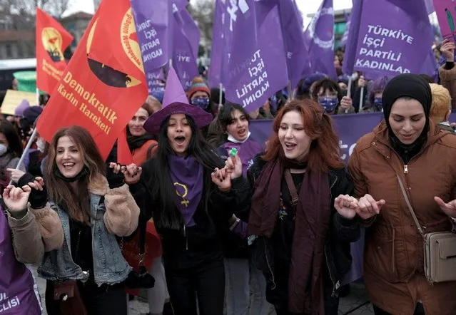 Demonstrators dance during a rally ahead of International Women's Day, in Istanbul, Turkey on March 6, 2022. (Photo by Murad Sezer/Reuters)