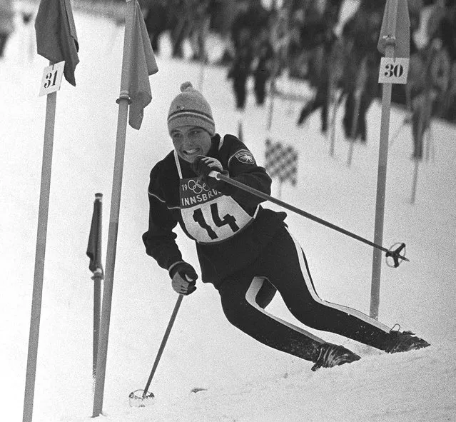 French skier Christine Goitschel gets ready to clear a gate during the first run of the women's slalom 01 February 1964 at the Winter Olympic Games in Innsbruck. Christine Goitschel finished second behind her younger sister, Marielle, but set the best time in the second run to capture the gold medal in front of her sister. (Photo by STAFF/AFP Photo/Getty Images)
