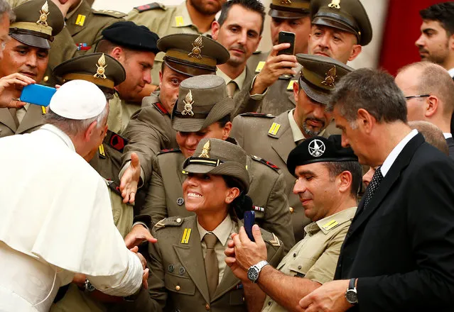 Pope Francis is greeted by Italian soldiers during the Wednesday general audience in Saint Peter's square at the Vatican, June 28, 2017. (Photo by Tony Gentile/Reuters)