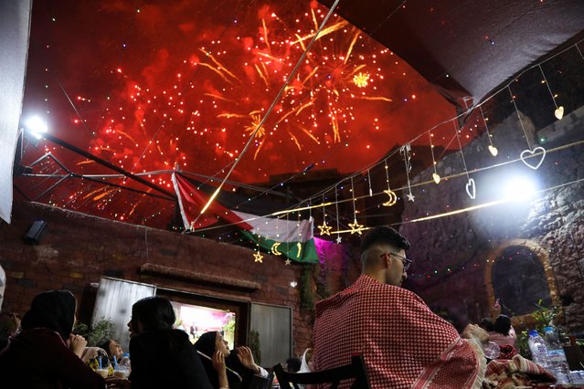 Fireworks explode during celebrations on the day of the royal wedding of Jordan's Crown Prince Hussein and Rajwa Al Saif, in Amman, Jordan on June 1, 2023. (Photo by Alaa Al Sukhni/Reuters)